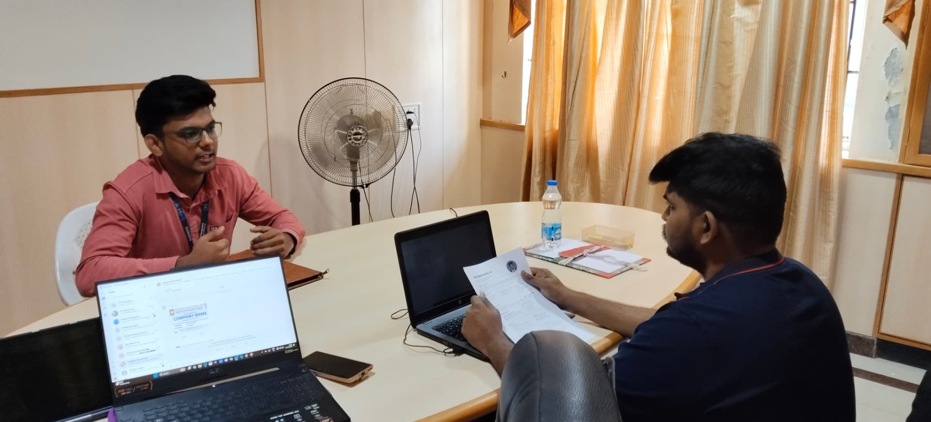 A Transit Matrix HR interview in progress with a candidate's resume under review