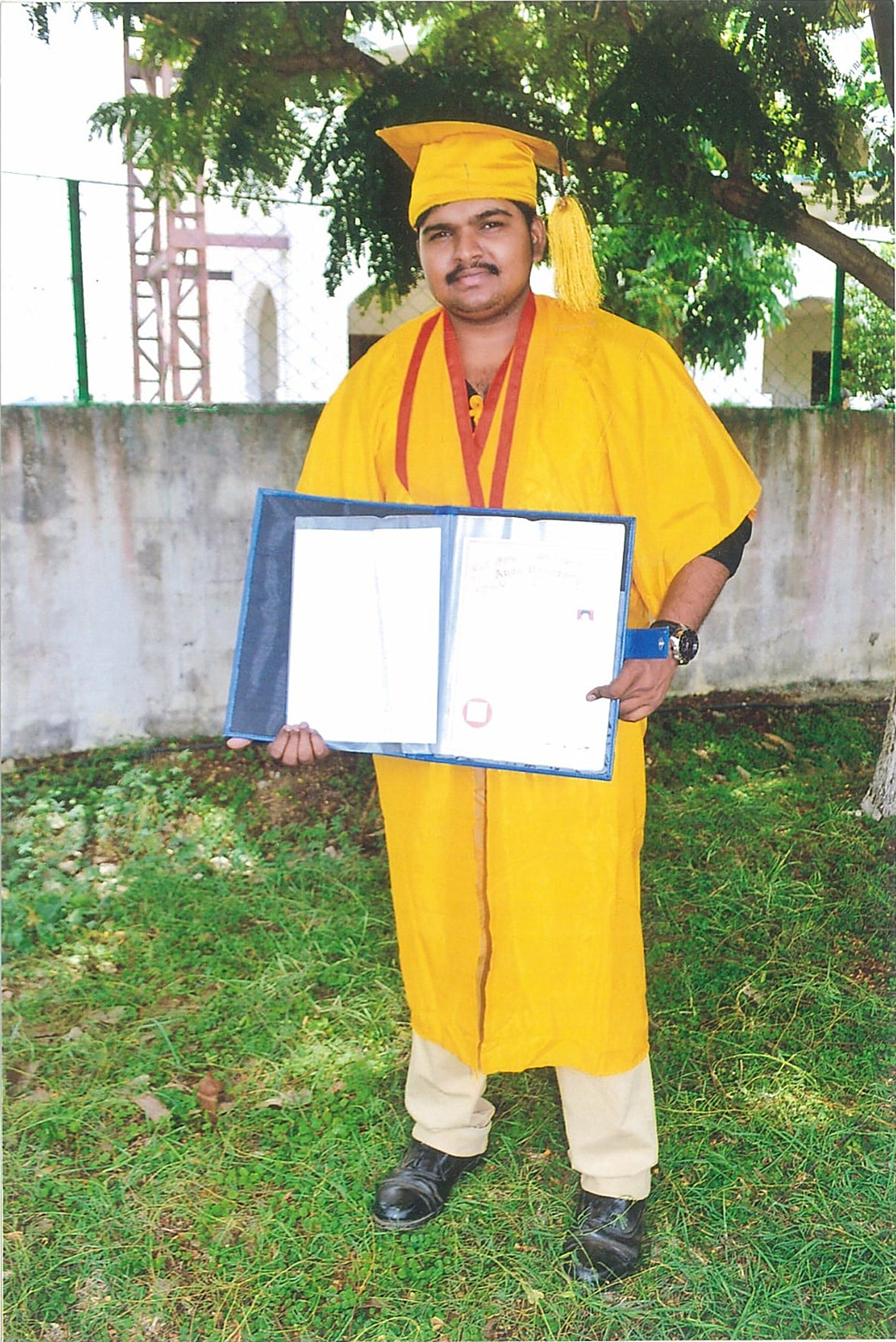 The founder of Transit Matrix HR at his graduation ceremony
